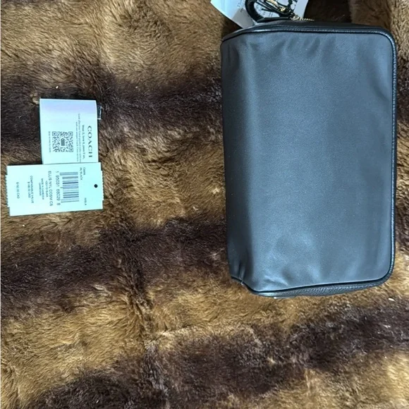 Coach Black Toiletry Bag with Gold Branding